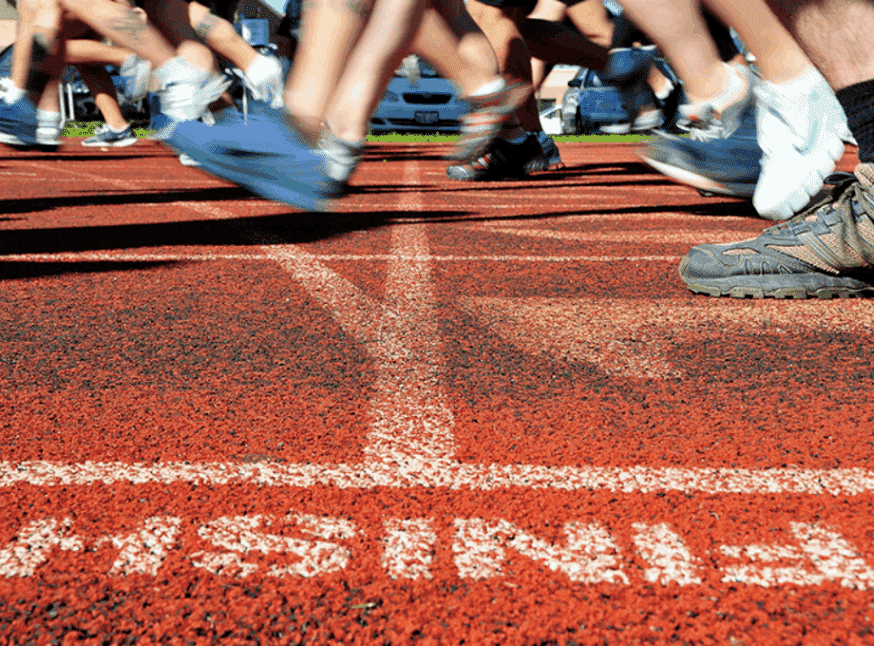 Track_Cross_Country_runners_at_finish_line_close_up_of_track_and_feet