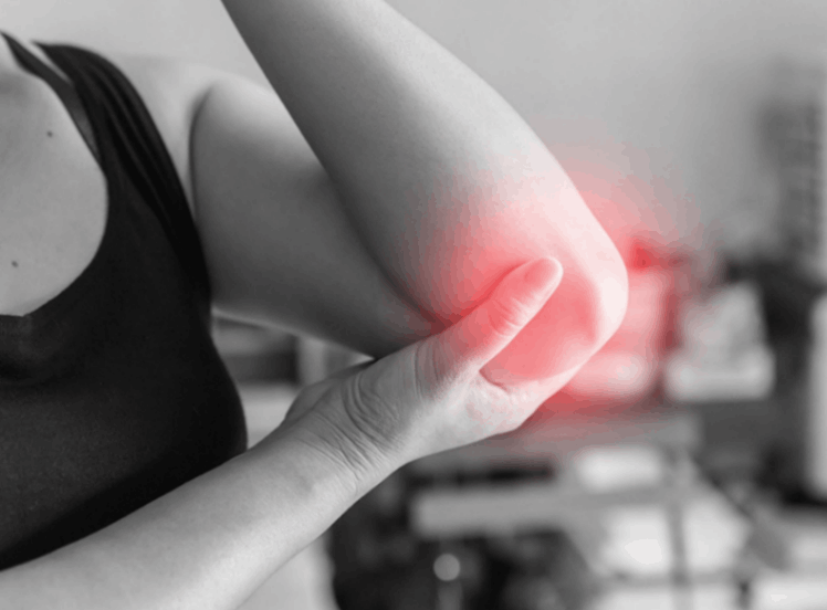 person_holding_elbow_injury_pain