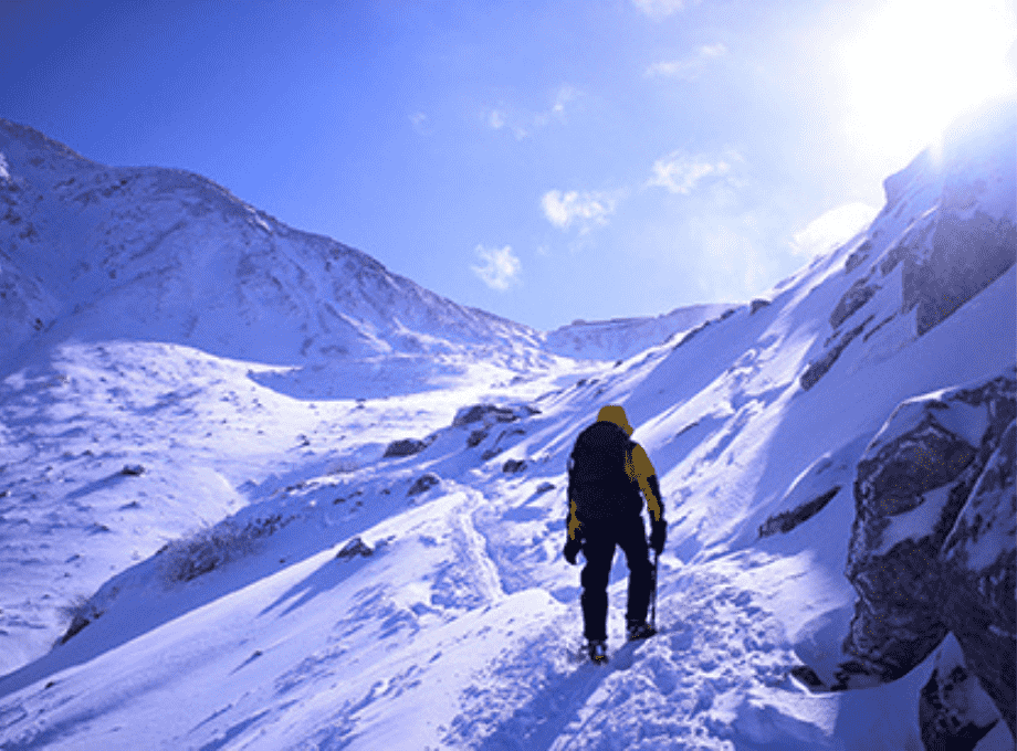 Man Climbing a Mountain like Mt. Everest